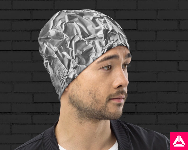 May include: A gray beanie with a crumpled foil pattern. The beanie is made of a soft, stretchy fabric and has a close-fitting design.