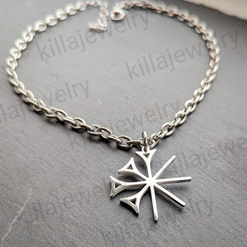 Collana con simbolo sumero Anu/Anunnaki in caratteri cuneiformi.