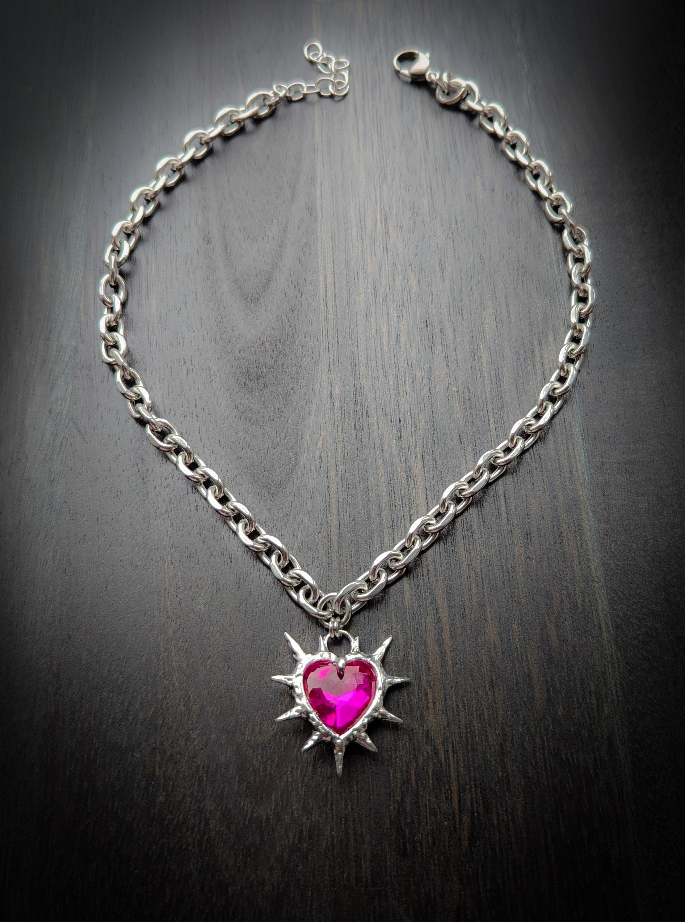 Pink spiiked heart pendant necklace