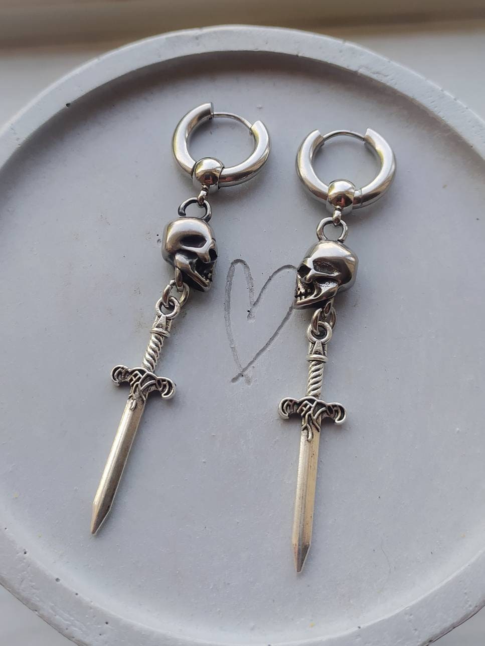 Hanging dagger deals earring