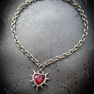 red spiiked heart pendant necklace