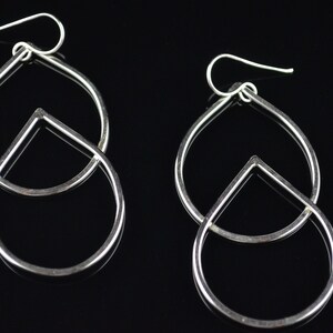 Teardrop Loops: sterling silver, handcrafted versatile drop and hook. Make this one-of-a-kind statement piece yours.