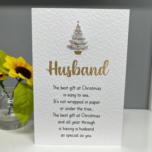Cartão de Natal do marido com árvore de Natal brilhante