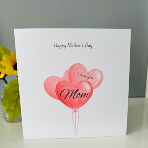Biglietto per la festa della mamma. Amo la mia mamma. Ti amo mamma. Ti amo mam. Ti amo mamma. Biglietto a forma di cuore con palloncino