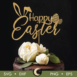 May include: Gold glitter cake topper with the words "Happy Easter" and a bunny ear design. The topper is on top of a chocolate cake with white flowers.