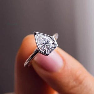 1ct Pear Moissanite Ring: 14K Gold Bezel Solitaire