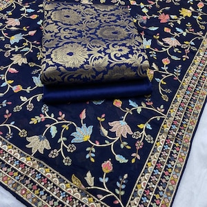 Beautiful Dress material in Banarasi katan Silk brocade Shirt with plain taffeta bottom and chinon embroidered dupatta.