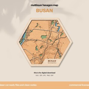 May include: A wooden hexagon map of Busan, South Korea, with laser-cut details. The map features a light wood finish with blue and green accents for water and parks. Text on the map reads "BUSAN" and "City in South Korea". The image also includes text about digital download formats.