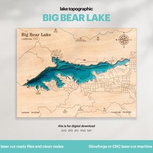 May include: A laser-cut wooden map of Big Bear Lake in California, USA. The lake is shown in shades of blue, with the surrounding terrain in brown. The map includes the latitude and longitude coordinates of the lake. The text "this is for digital download" is printed below the map, along with the file formats available: SVG, EPS, JPG, PNG, and DXF. The text "laser cut ready files and clean nodes" is printed below the file formats. The text "Glowforge or CNC laser cut machine" is printed below the laser cut ready files and clean nodes.