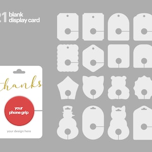 May include: Twenty-one blank display cards in various shapes, including a snowman, a cat, a bear, a star, a heart, and a circle. The cards are white and have a hole in the center. The text "thanks" is written on a white card with a red circle that says "your phone grip".