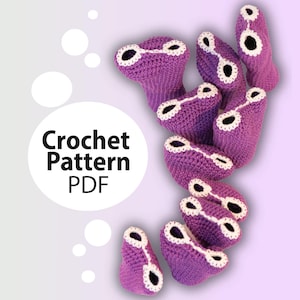 May include: A crochet pattern PDF for a purple and white crocheted coral reef. The coral is made of multiple crocheted pieces that are joined together.