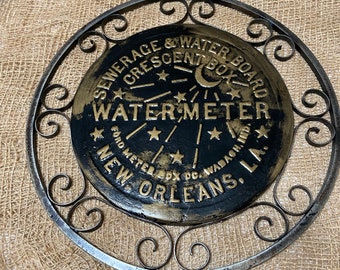 Replica New Orleans water meter cover with hand made Iron lace work