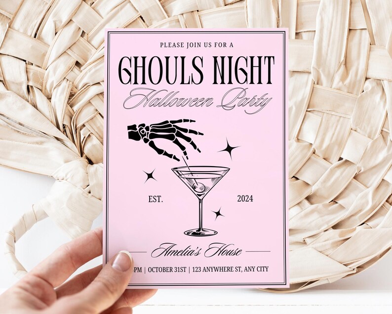 May include: Pink invitation card with black text that reads "Please join us for a Ghouls Night Halloween Party" with a skeleton hand holding a martini glass. The text also includes "EST. 2024" and "Amelia's House" with the address "PM | OCTOBER 31ST | 123 ANYWHERE ST, ANY CITY".