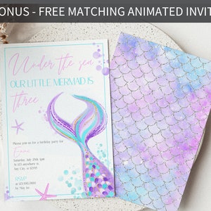 May include: A printable invitation for a little mermaid themed birthday party. The invitation features a purple and teal mermaid tail with glitter accents and the text "Under the sea our little mermaid is three".