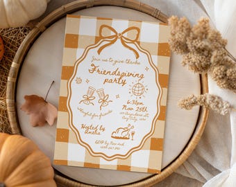 May include: An invitation for a Friendsgiving party with a gingham background. The invitation has a decorative border and includes the text "Join us to give thanks Friendsgiving party" and event details. The invitation is on a wooden tray.