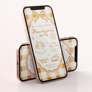 May include: Two rose gold smartphones displaying a Friendsgiving party invitation. The invitation features a yellow and white gingham pattern, decorative bows, and handwritten text. The text includes "Join us to give thanks", "Friendsgiving party", and event details.