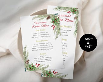 May include: Two white Christmas dinner menus with festive watercolor greenery and red berry accents. The menus feature a Christmas Dinner Menu and a Christmas Drinks Menu. The menus are available in 5x7" and 4x9" sizes.
