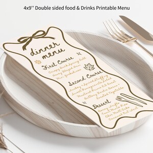May include: A double-sided printable dinner menu, measuring 4x9 inches, with a beige background and brown text. The menu includes courses like Crispy Duck Spring Roll and Berry Trifle. The menu is placed on a wooden plate with a fork and knife.