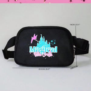 May include: Black fanny pack with a colorful graphic that reads "Magical Bliss Crafts". The design includes a castle, fairy, and stars. The fanny pack measures 20.5 cm (8.07 inches) long, 14 cm (5.51 inches) high, and 5 cm (1.96 inches) deep.