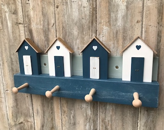 Beach huts with wooden hanging pegs, Coat pegs, Coat hooks, Coat rack