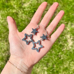 supernova star earrings
