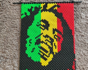 Banner de arte con cuentas de Bob Marley