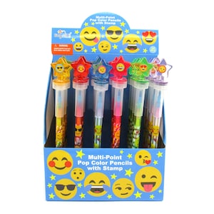 May include: A display box of multi-point pop color pencils with stamps. The pencils have star-shaped toppers with emoji faces. The box is decorated with yellow emoji faces and stars. The text "Multi-Point Pop Color Pencils with Stamp" is visible.