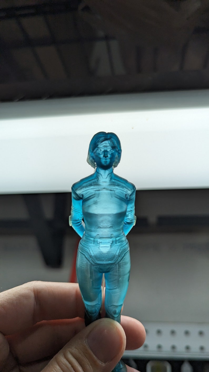 The Weapon Resin Figure — photographed physical product