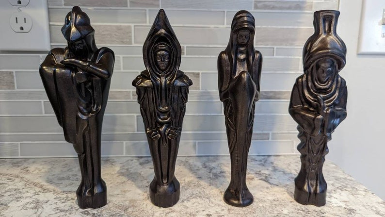 Set of dark resin fantasy statues from Odie's Prop Shop