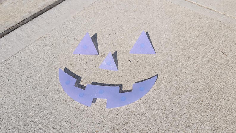 Glow Pumpkin Face Inserts — photographed physical product