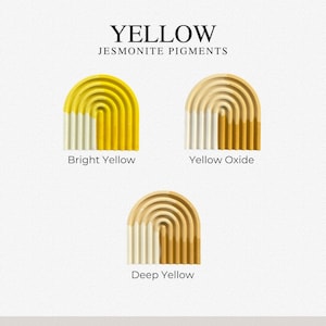 May include: Three arched, ribbed Jesmonite samples displaying yellow pigment variations. The top left is labeled Bright Yellow, the top right is Yellow Oxide, and the bottom center is Deep Yellow. Each arch features a white base transitioning into a solid yellow tone.