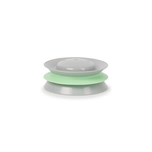 May include: A gray and green cat toy with a spinning disc. The toy is made of plastic and has a soft, green rubber ring around the base.