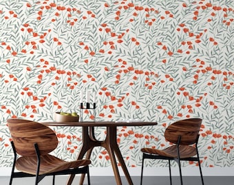 May include: A dining room scene featuring a round wooden table and two chairs. The chairs have a curved wooden back and black metal legs. The wallpaper has a floral pattern with red flowers and green leaves on a cream background. A black candle holder and a bowl of fruit are on the table.