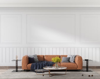 May include: A modern living room featuring a brown leather sofa, two black side tables, and a marble-topped coffee table. The room has a white paneled wall, a gray rug, and decorative pillows. A blue throw blanket and yellow flowers add color.