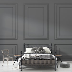 Modern textured black wallpaper with raised panel effect