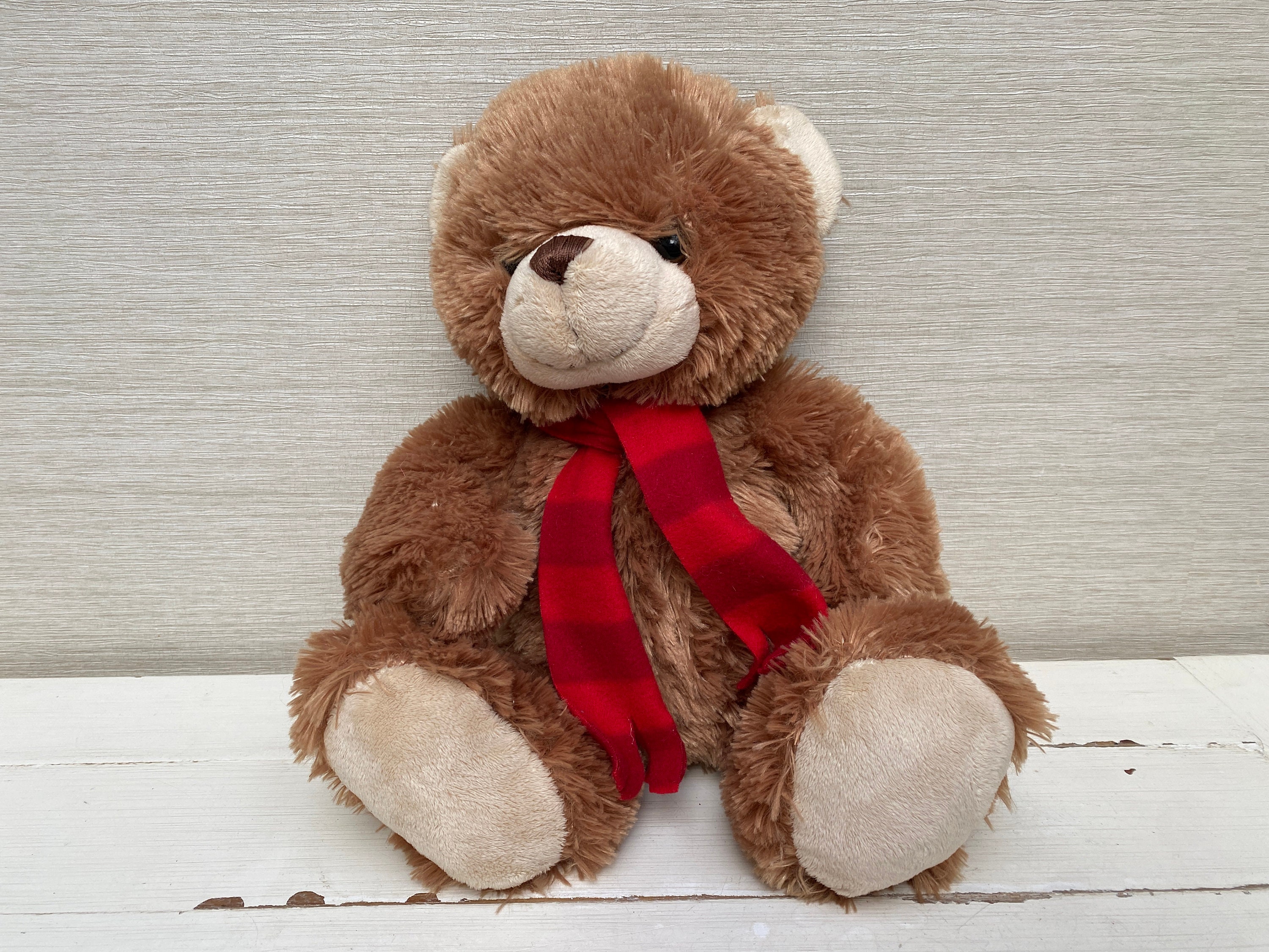 Teddy bear with red scarf discount