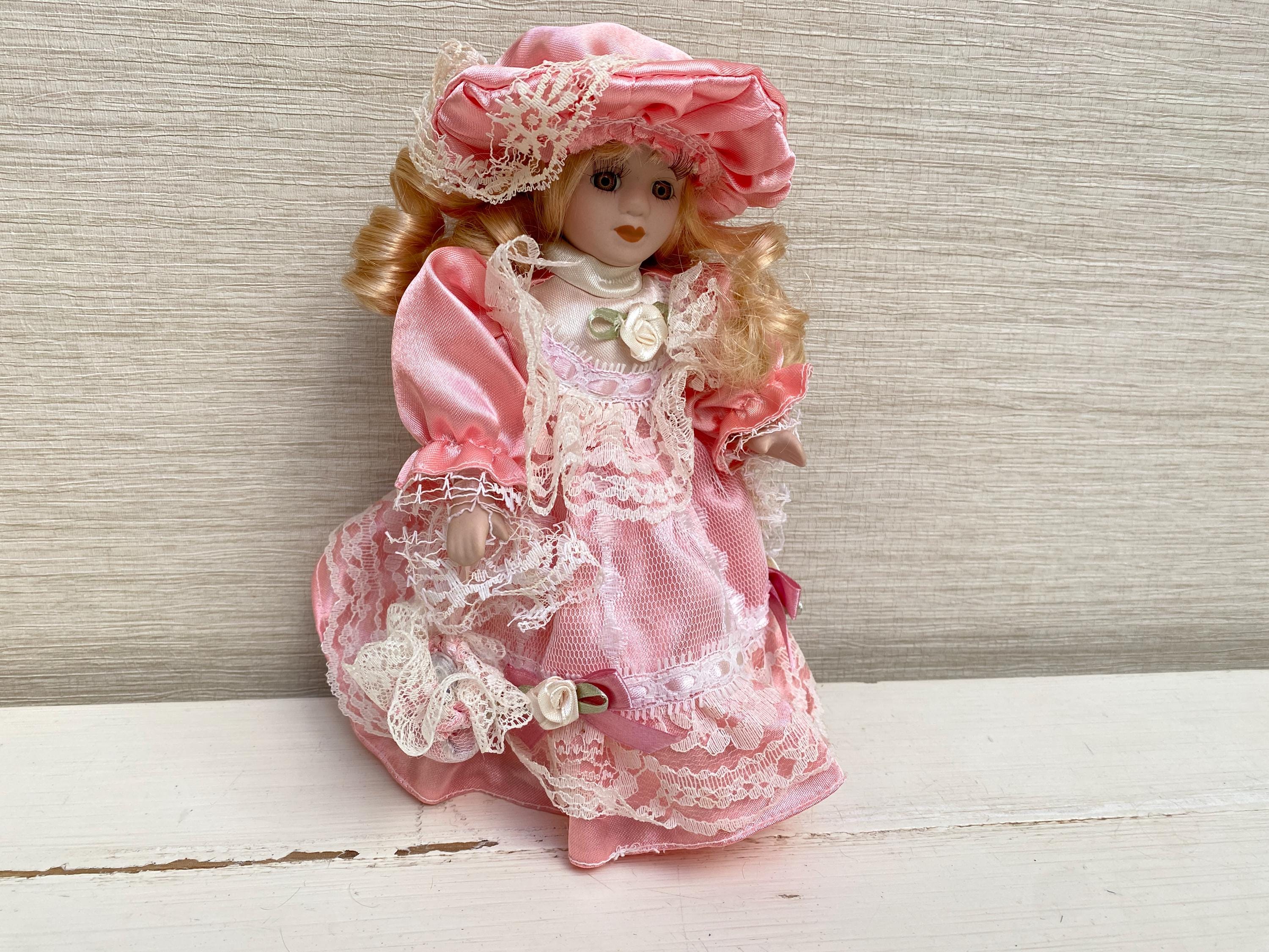 Vintage Small Porcelain Girl Doll Pink Dress  Blonde Hair with Ringlets 21 cm