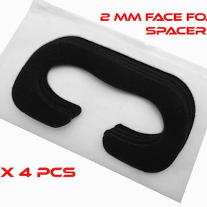 May include: Black 2 mm face foam spacers, packaged in a clear plastic bag. The text "2 MM FACE FOAM SPACERS" and "X 4 PCS" are printed in red. The spacers are curved and designed for comfort.