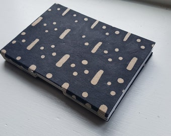 Buttonhole notebook