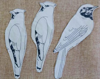 Hand cut fabric birds