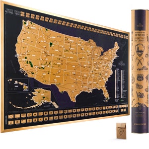 May include: A gold foil scratch-off map of the United States with a black background. The map shows all of the national parks and landmarks. The map is rolled up in a tube with a brown and gold design. The tube has the text "Scratch Off Map of the USA National Parks and Landmarks" and "#TRAVELIZATION".