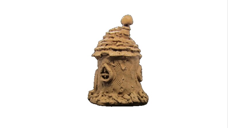 May include: A small, brown, clay fairy house with a rounded roof and a chimney. The house has a small window and is decorated with textured details.