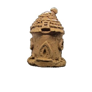 May include: A small, brown clay house with a pointed roof and a chimney. The house has a small door and windows, and is decorated with details like a fence and a flower.