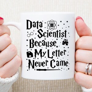 May include: White ceramic mug with black text that reads "Data Scientist Because My Letter Never Came." The text is in a Harry Potter-inspired font and includes various Harry Potter-themed icons.