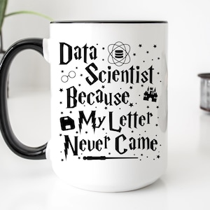 May include: White ceramic mug with a black rim and handle. The mug features a black graphic that says "Data Scientist Because My Letter Never Came" with various Harry Potter-themed symbols.