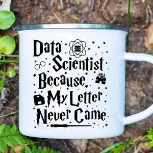 May include: White enamel mug with a black design that reads "Data Scientist Because My Letter Never Came." The design includes a database symbol, glasses, a castle, a lock, and a lightning bolt.