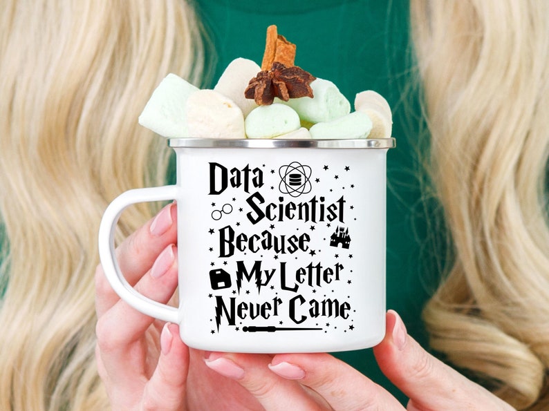 May include: White enamel mug with a black design that says "Data Scientist Because My Letter Never Came" with a wand, glasses, and other Harry Potter themed graphics.