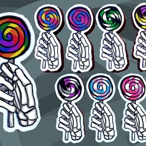 May include: A set of eight skeleton hand stickers holding colorful lollipop-shaped stickers. The lollipops are in various colors, including rainbow, green, blue, pink, and purple.