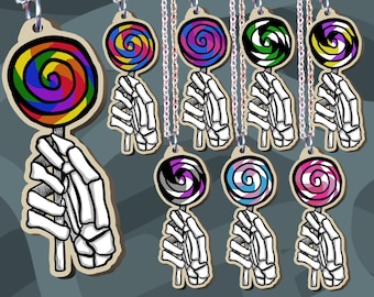 Necklaces in the shape of skeleton hands, in the colors of LGBT flags (gay/ lesbian/ trans/ bi/ pan/ asexual/ agender/ non-binary)