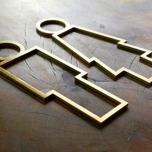 Restroom door sign WC pictogram, disabled symbol arrow and more wayfinding - Gold plated stainless steel